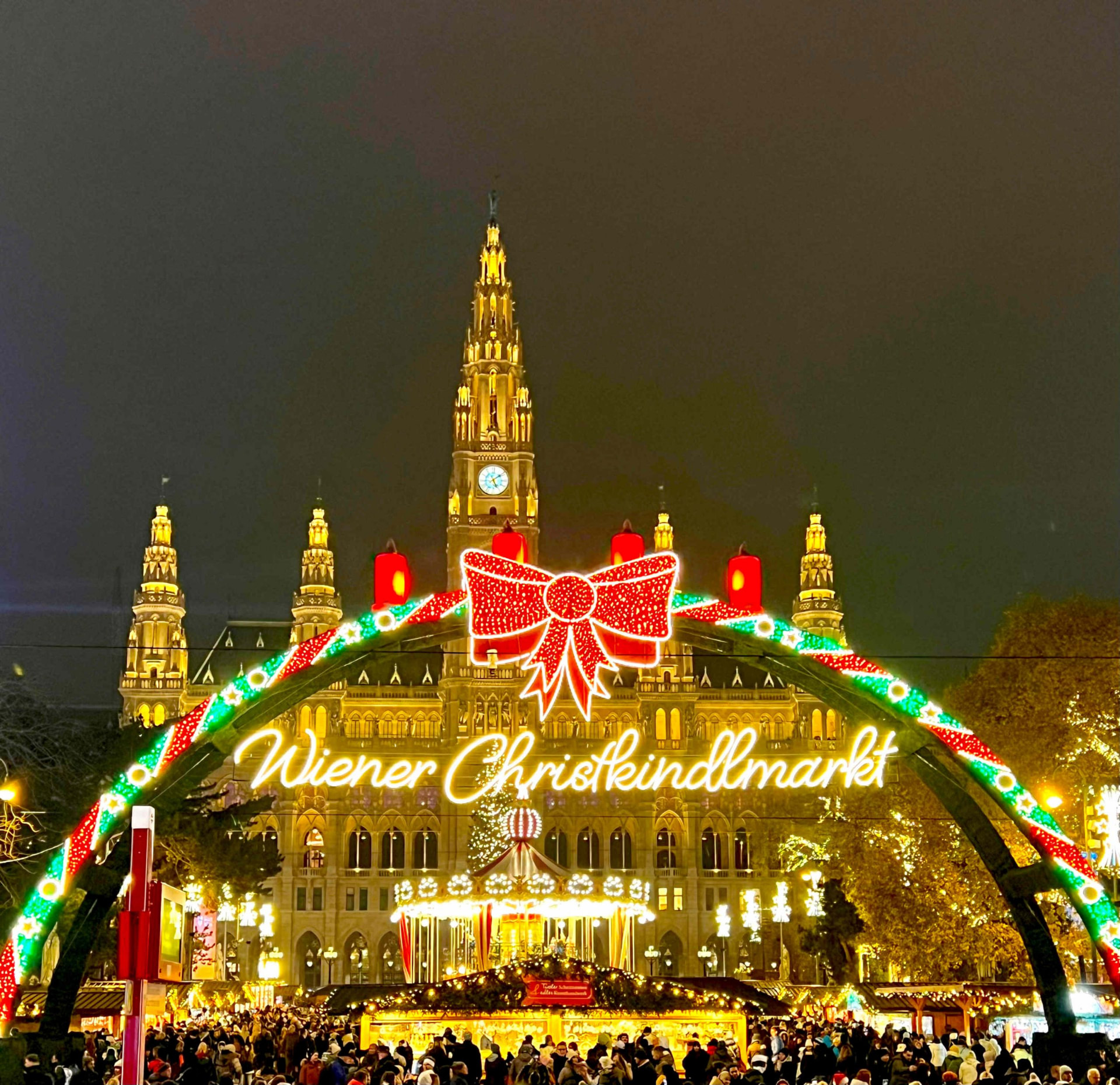 Vienna – Illuminated Christmas market at Rathausplatz in Vienna at dusk