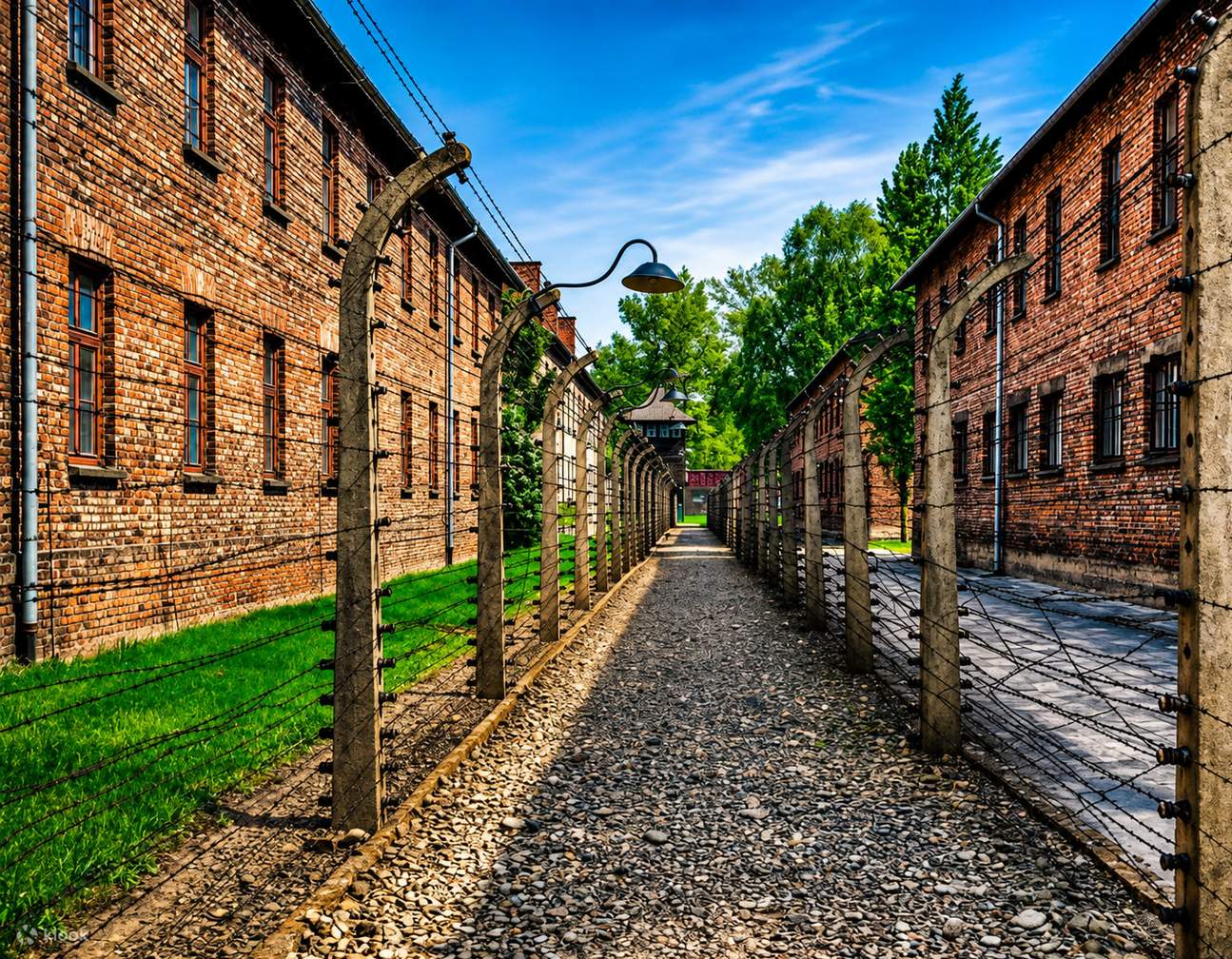Brick prisoner blocks and fencing at Auschwitz I